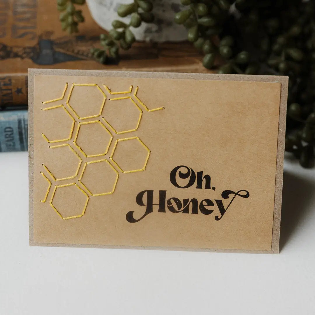 greeting card with honeycomb design and 'Oh Honey' text 