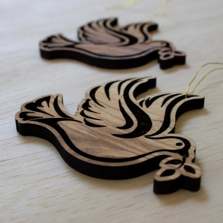 Olive wood dove ornaments side view 