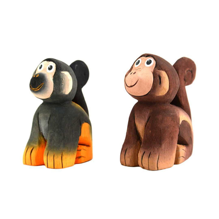 two painted balsa wood monkeys