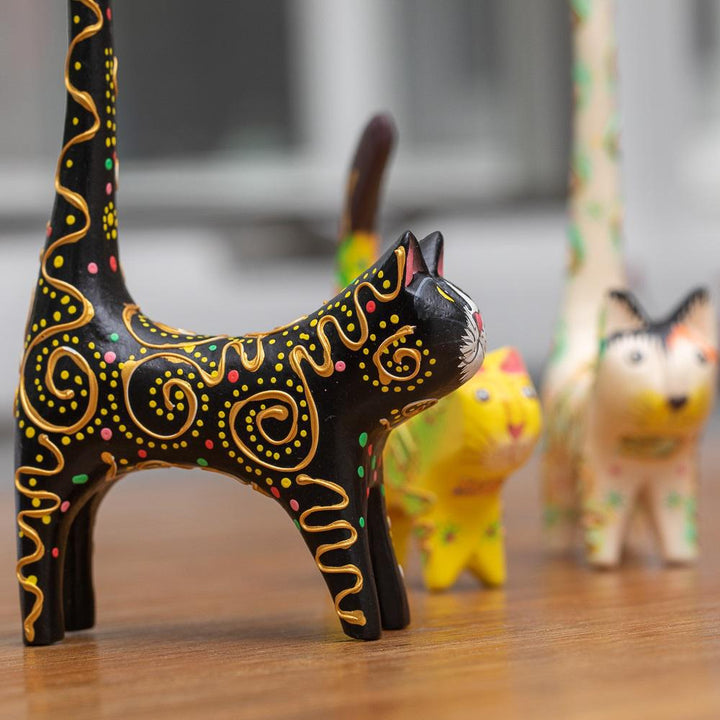 painted party cat on a colorful background