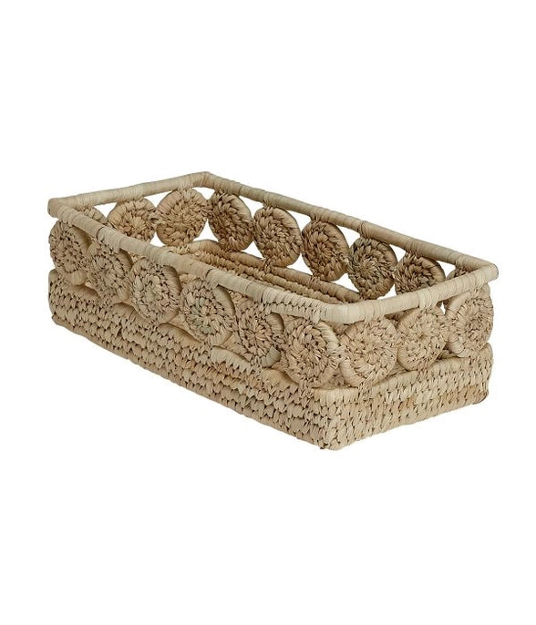 Woven rectangular basket with circular patterns on a white background