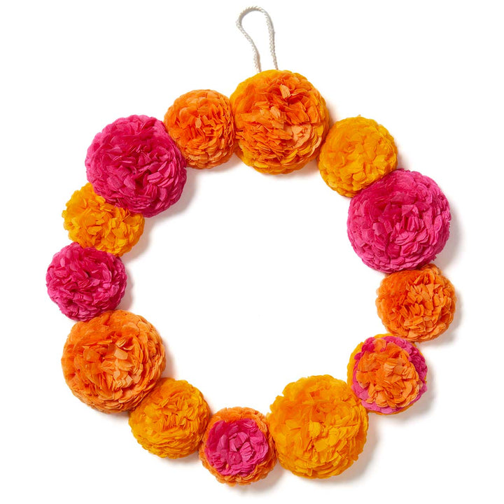 Decorative wreath with pink and orange flowers on a white background