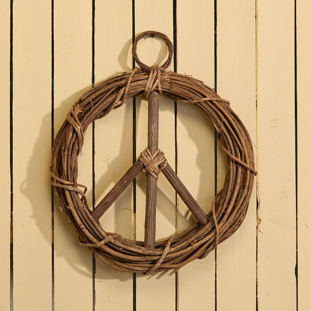 Peace wreath on a painted wood background
