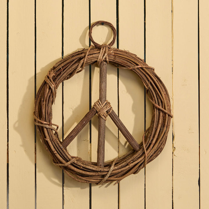 Peace wreath on a painted wood background