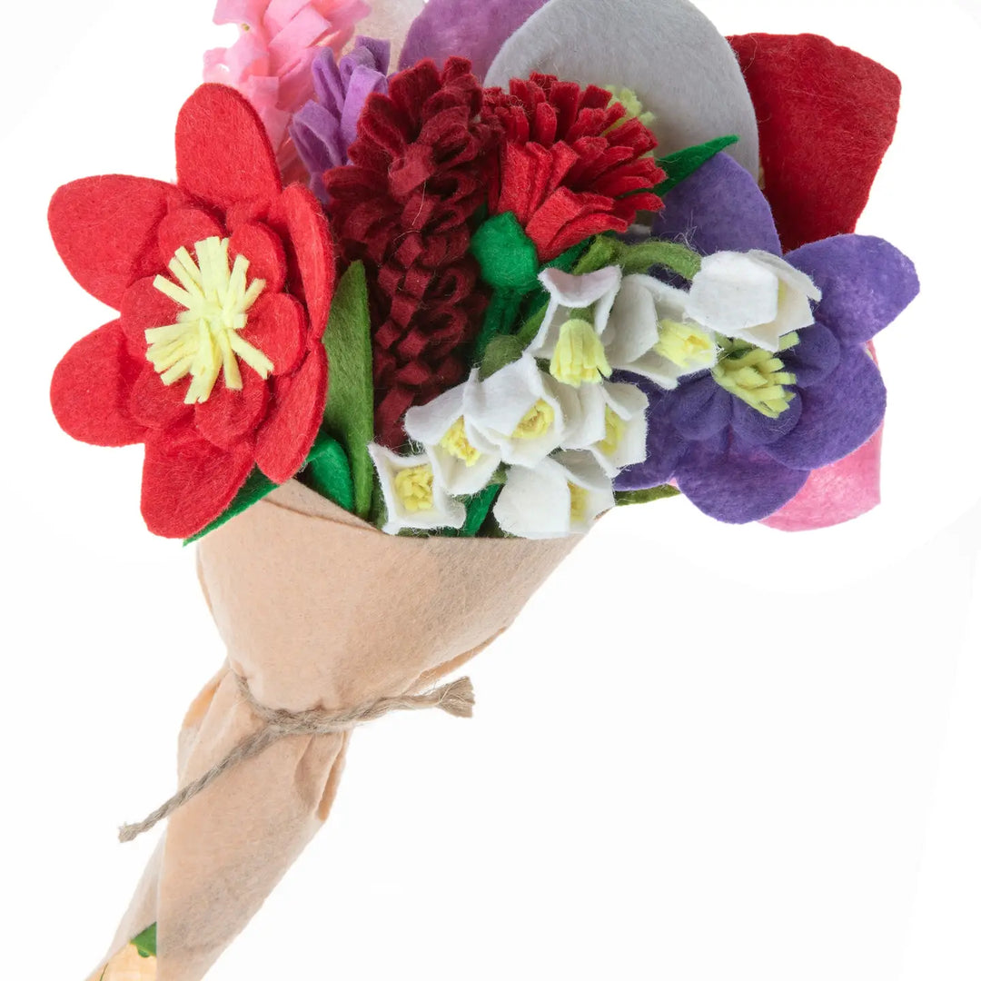 Colorful felt flower bouquet on a white background