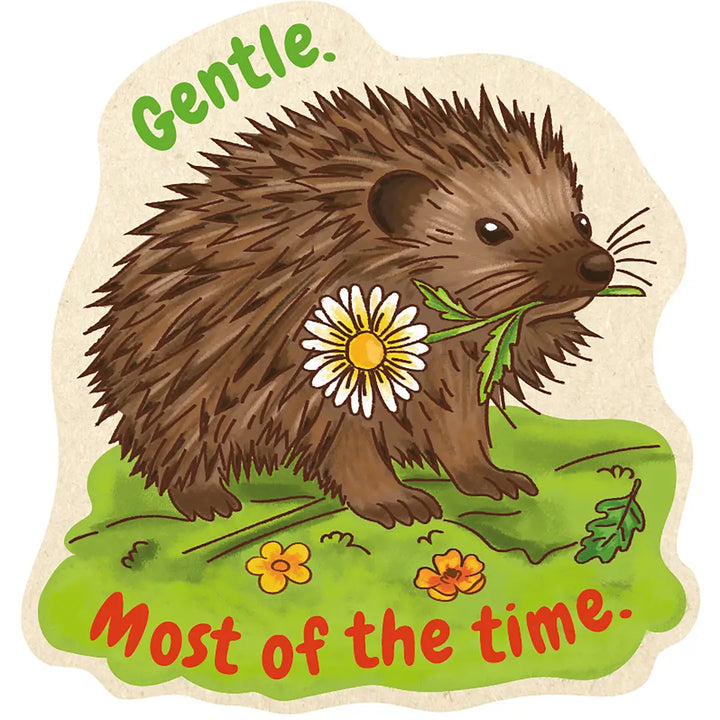 A die-cut sticke featuring an illustrated brown hedgehog standing on green grass with a white daisy in its mouth. The word 'Gentle.