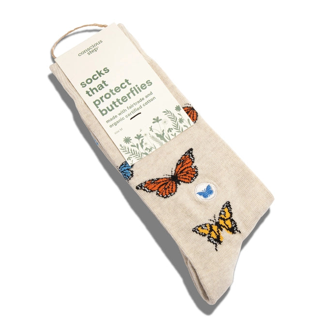 Beige crew socks that protect butterflies on a white background