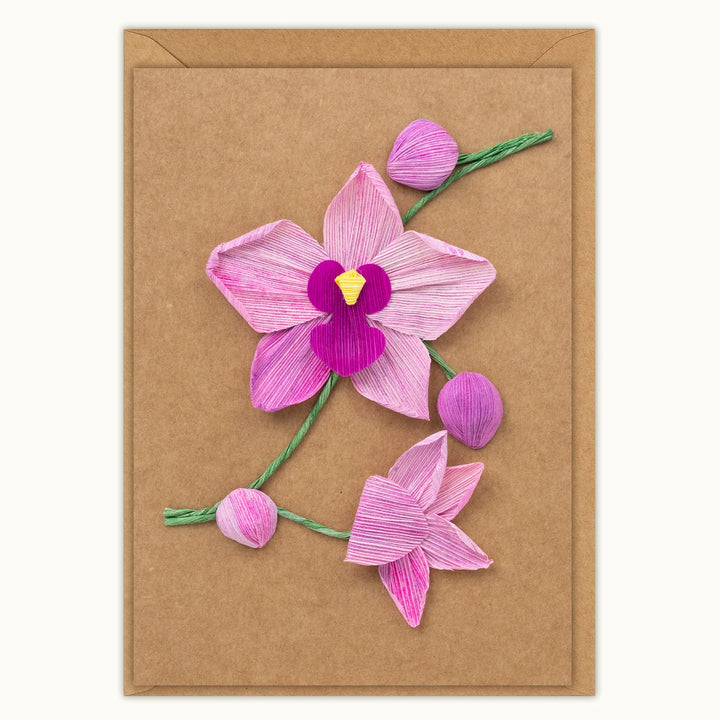 Card with pink/purple orchid design on a brown background