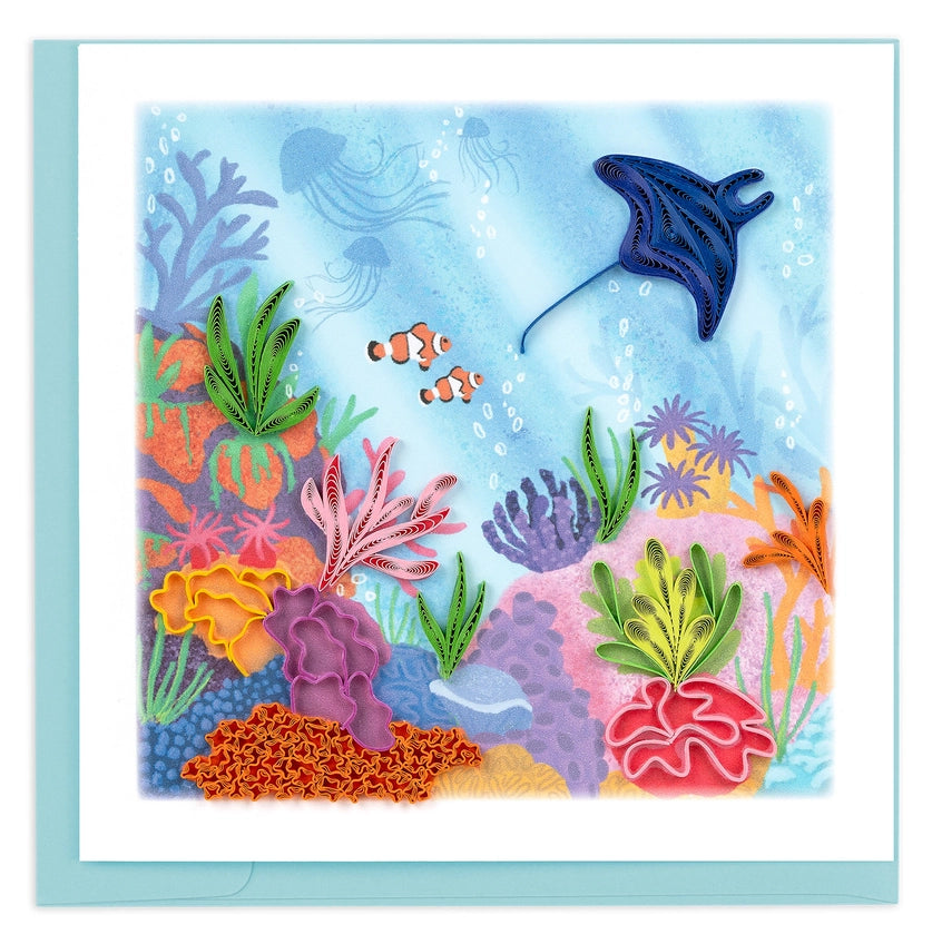 Colorful underwater scene with fish and coral on a light blue background on a quilled card