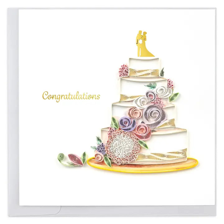 Wedding cake with floral decorations and 'Congratulations' text on a white background