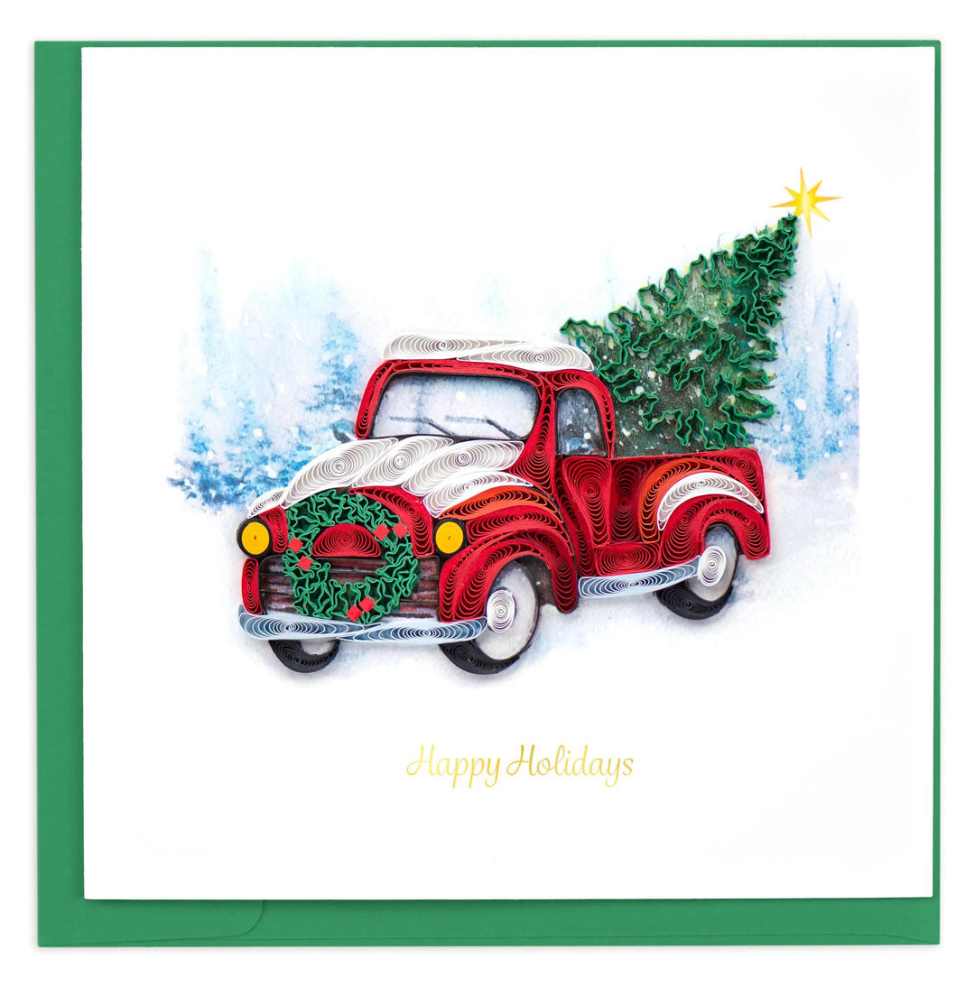 Red truck quilling card with Christmas tree and wreath on a snowy background, 'Happy Holidays' text.
