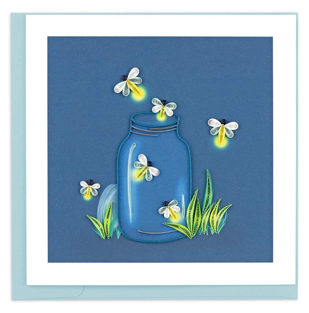 A greeting card featuring a blue jar with fireflies and grass on a dark background, with a white border around the card.