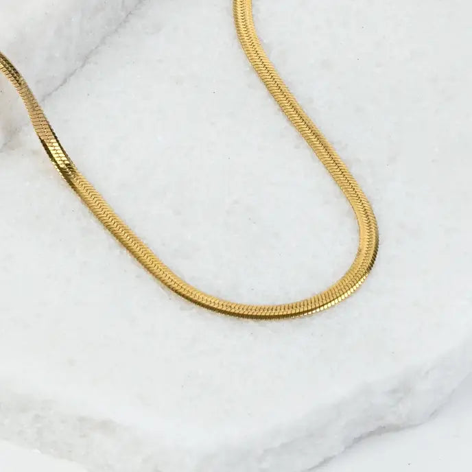 a gold snake chain necklace