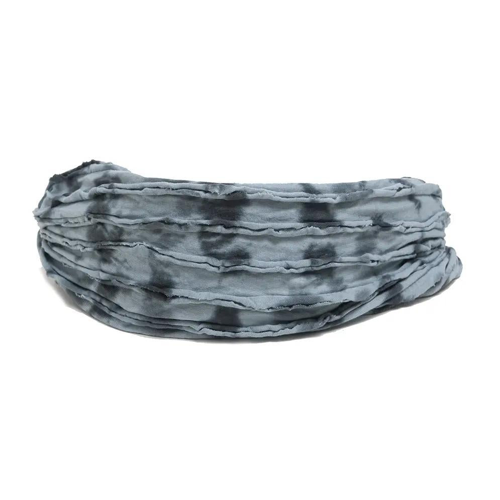 Gray and black patterned headband on a white background