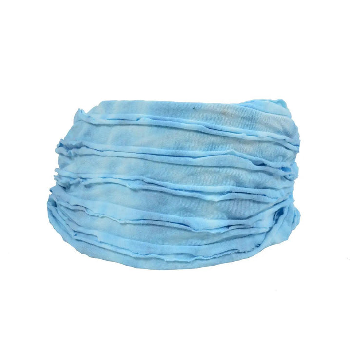 A light blue headband on white background.