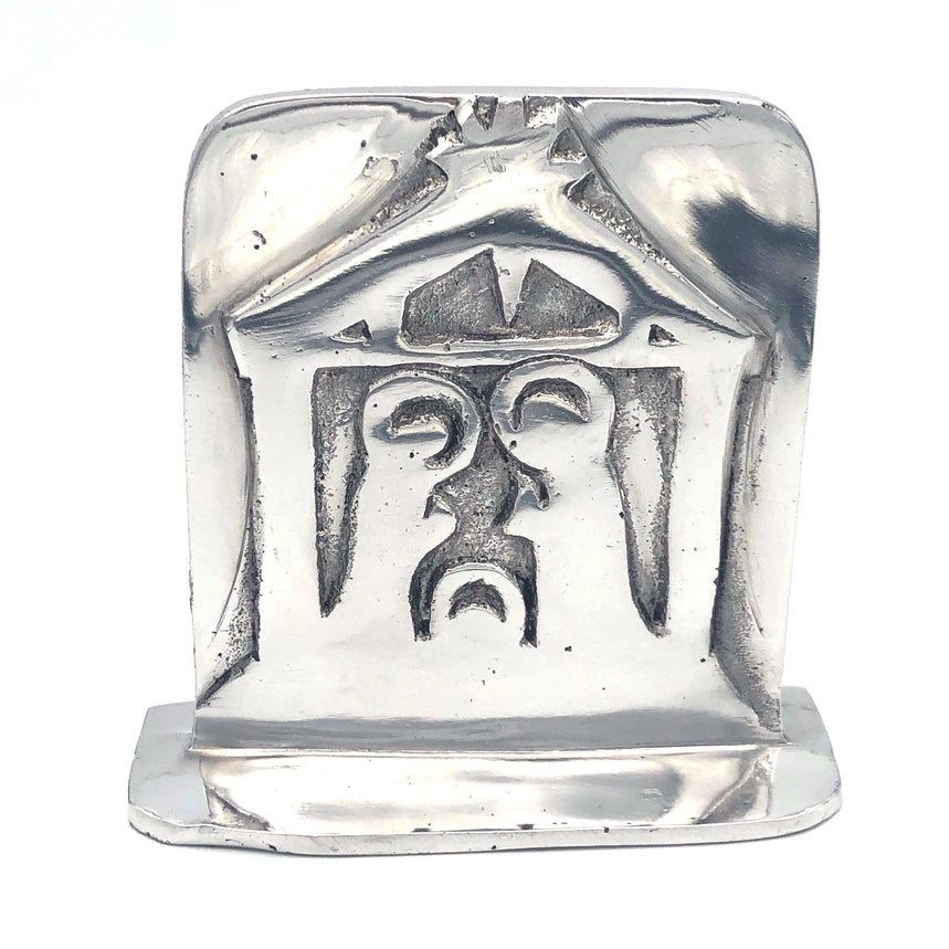 A polished silver-toned metal nativity, shown against a plain white background.