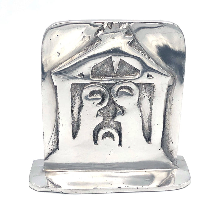 A polished silver-toned metal nativity, shown against a plain white background.
