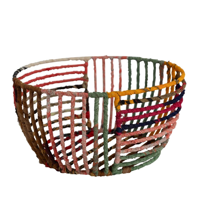 Multicolored wire basket on a white background