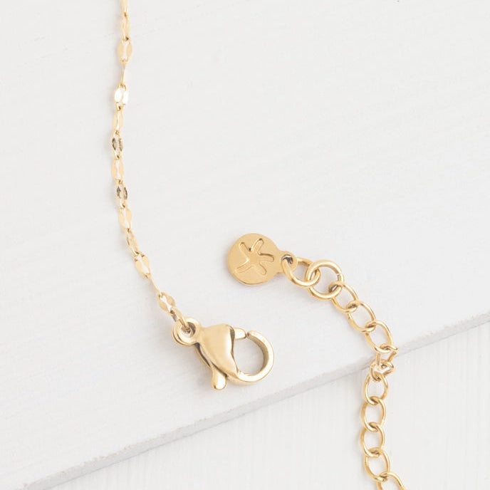 a gold plated clasp with a starfish 