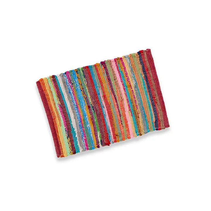 Multicolored striped placemat on a white background