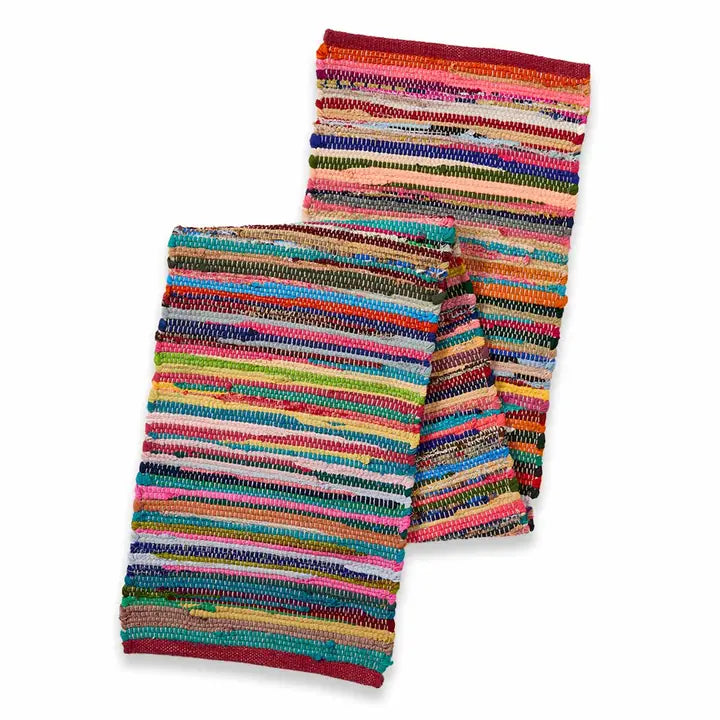 Colorful remnant sari table runner on a white background