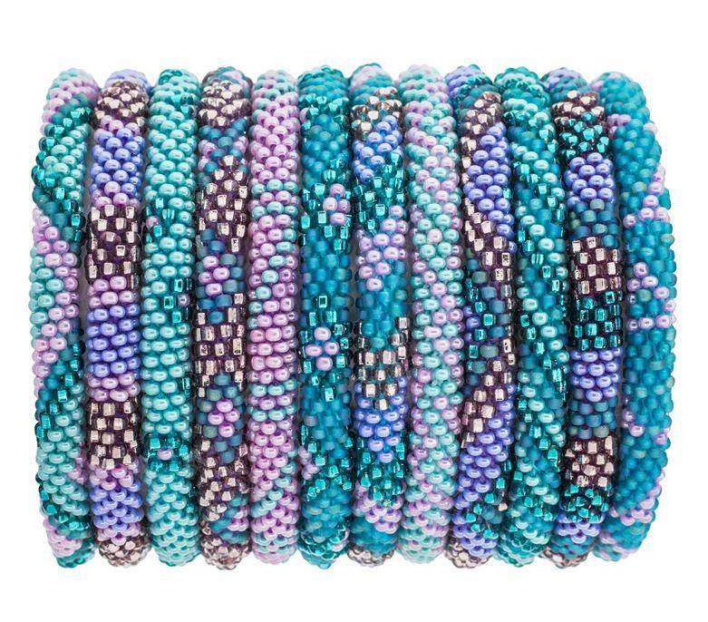 Multicolor beaded roll-on bracelets with blue, purple, and silver beads displayed on a roll.