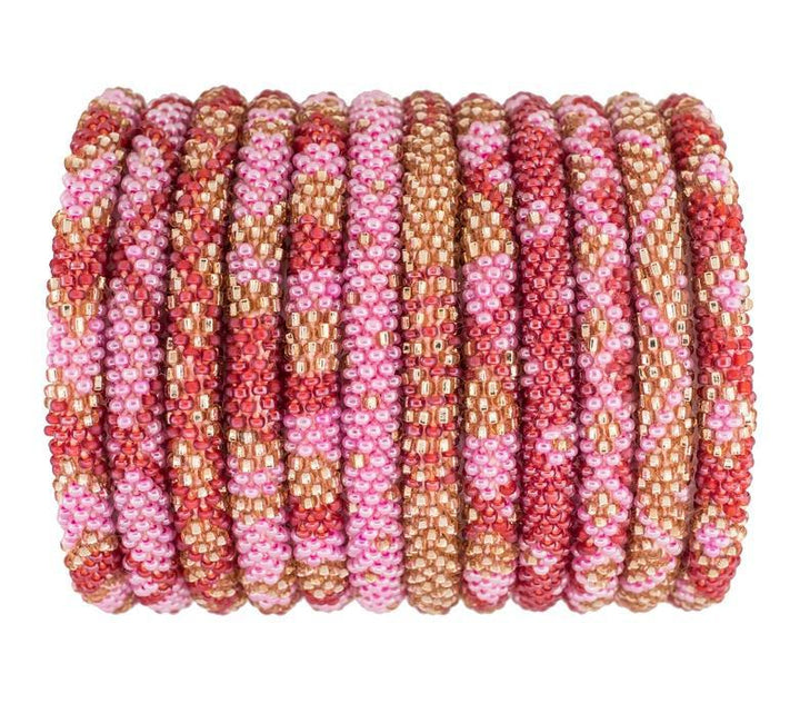 A multicolored bracelet with a geometric pattern, featuring hibiscus shades of pink and brown, and red.