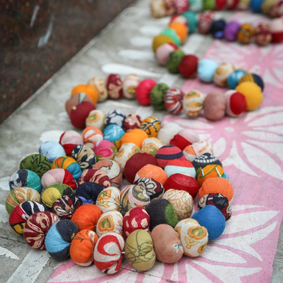 colorful sari bead garland coiled up 