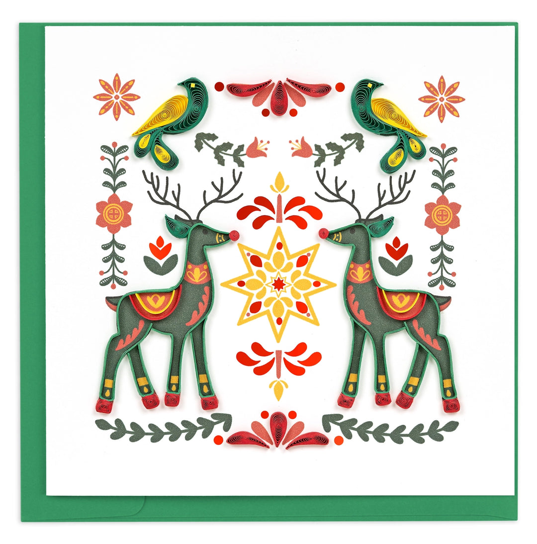 Decorative quilling  card with reindeer, birds, and floral patterns on a white background.