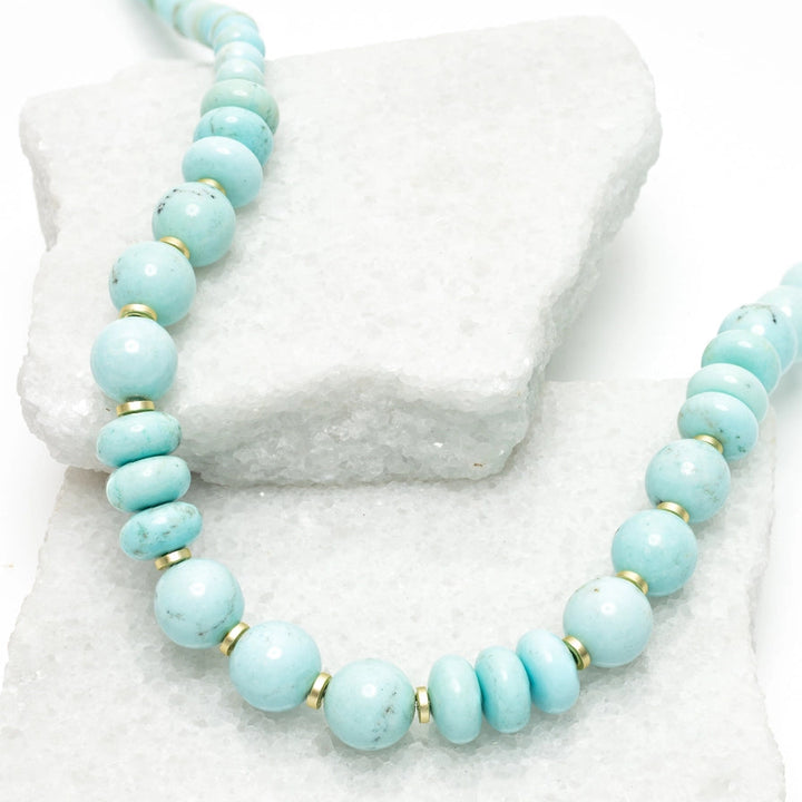 turquoise necklace on a white background 