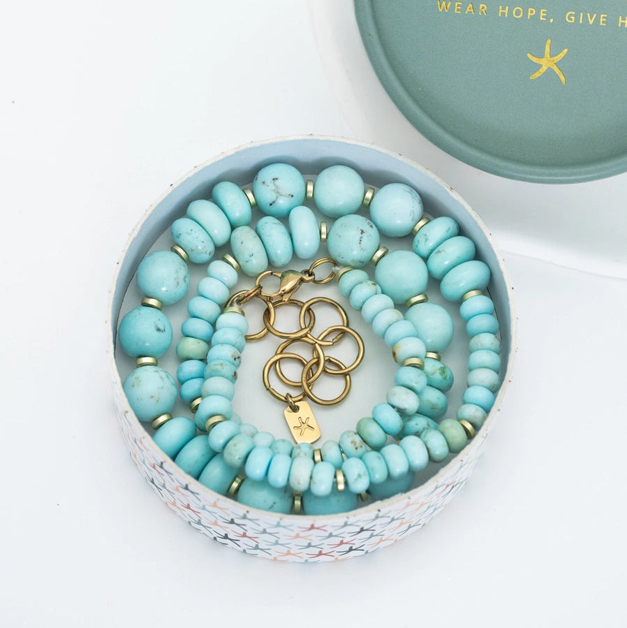 turquoise necklace in a Starfish Project box