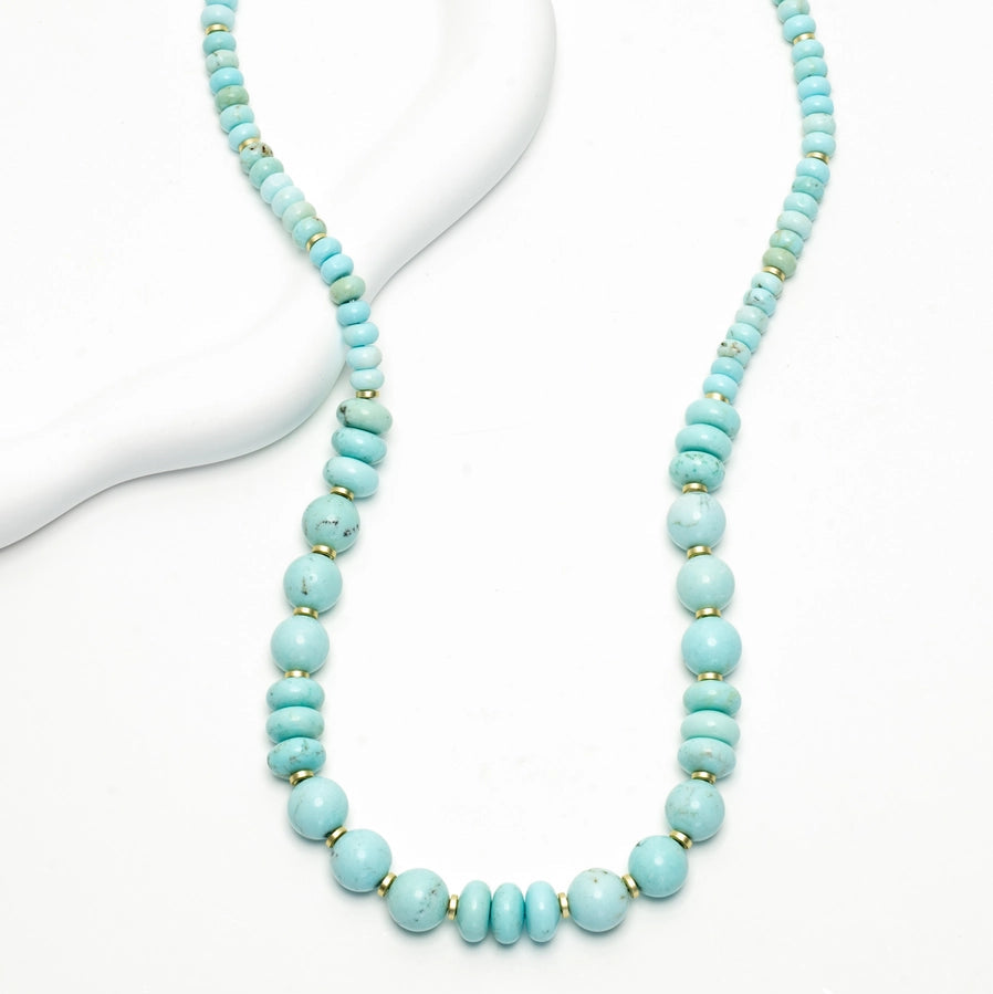 turquoise necklace on a white background 
