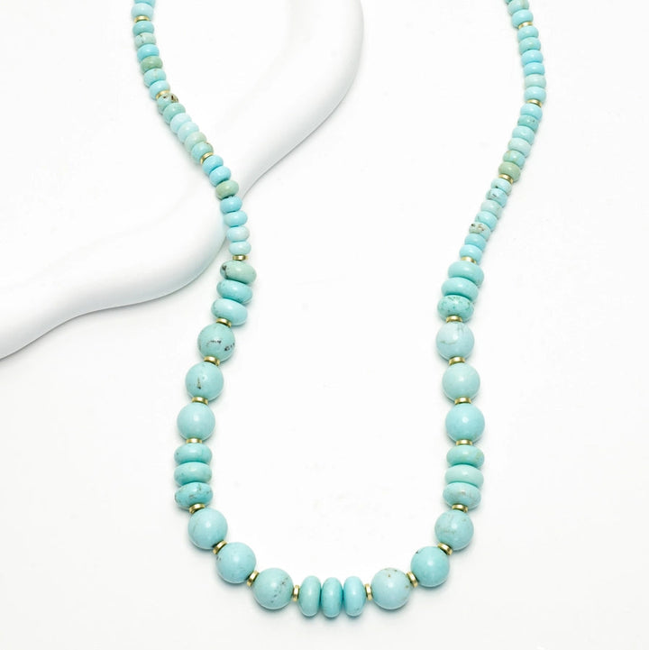 turquoise necklace on a white background 