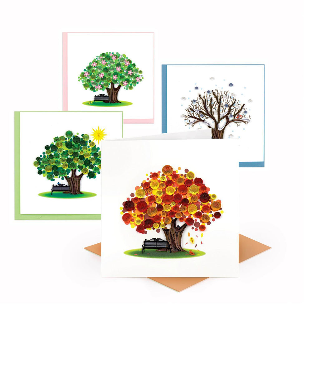 Four quilling cards each with a different season on a white background