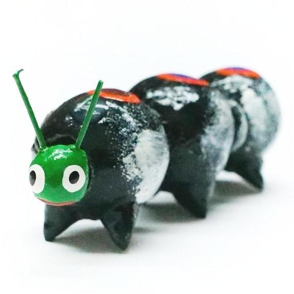 Small figurine resembling a bug made from a gourd on Mexico.