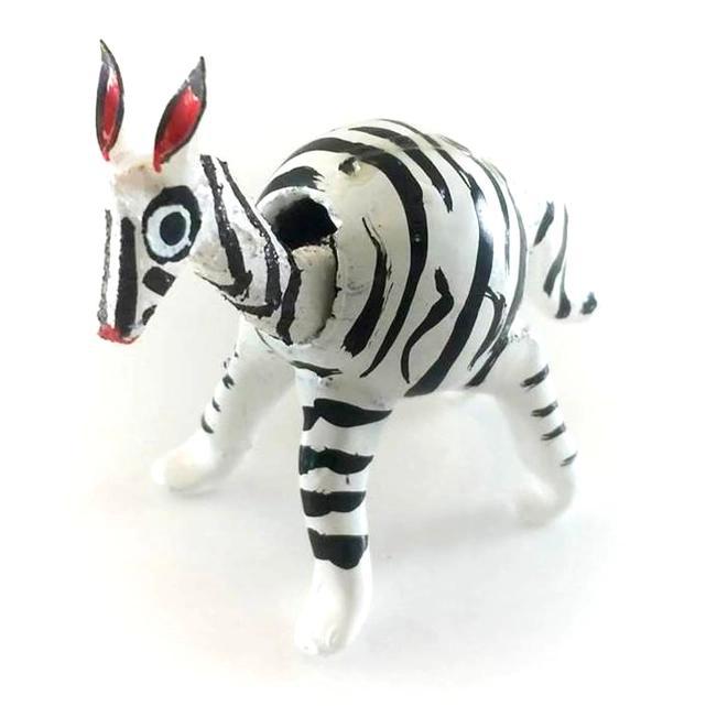 Small figurine resembling a zebra made form a gourd in Mexico.