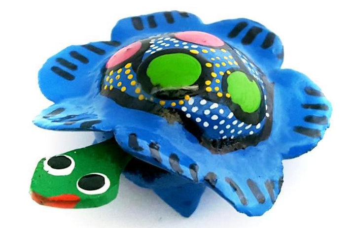 Small figurine resembling a turtle or flower made from gourd in Mexico.