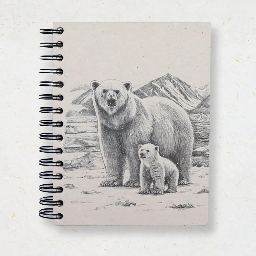 Mr. Ellie Pooh notebook with a drawing of a polar bear and cub on a mountainous background