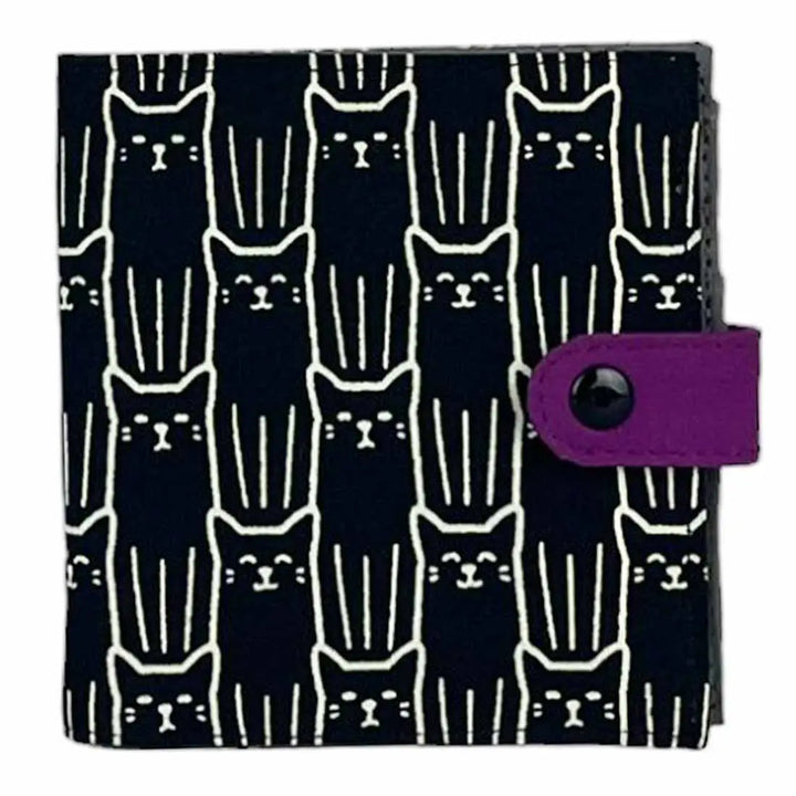 Wallet with white cat pattern on black background and purple accent