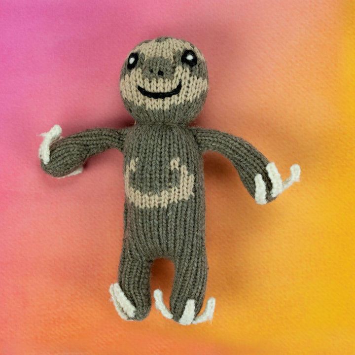 A handmade wool doll depicting a sloth