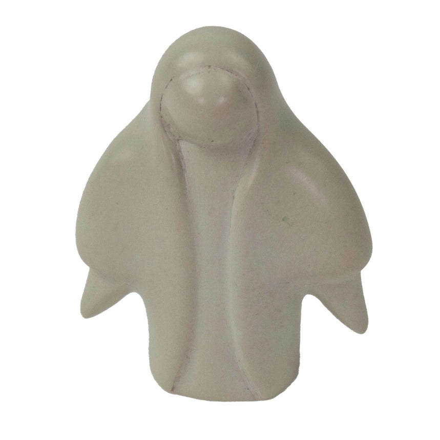 A small sculpted figurine of Mary  on a white background.