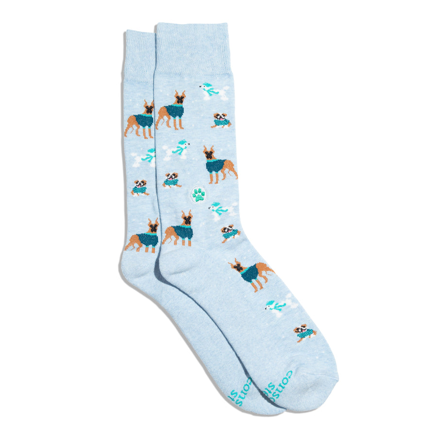 Light blue socks with dog pattern on a white background