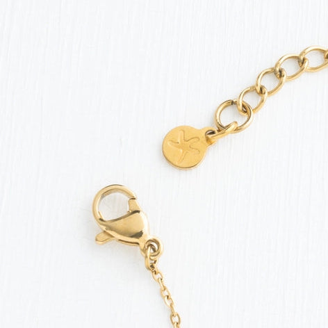 Gold clasps on a white background