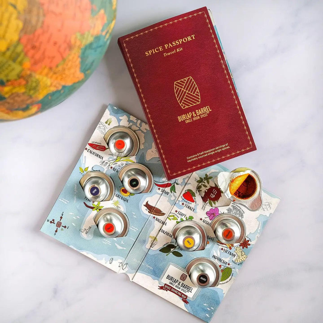 Spice passport travel kit with a globe in the background