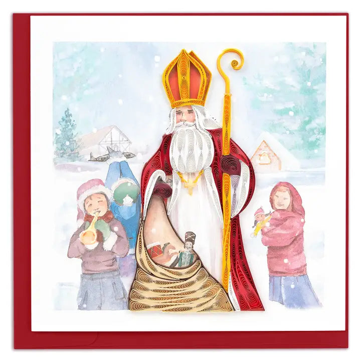A square greeting card featuring a watercolor illustration of Saint Nicholas in a snowy winter village. Saint Nicholas is depicted wearing a red and gold mitre, a long white beard, and a red cloak, holding a golden staff.