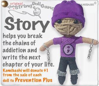 A handcrafted string doll with a purple outfit and chains on their arms. The doll is displayed with a nametag and has a keyring attachment.
