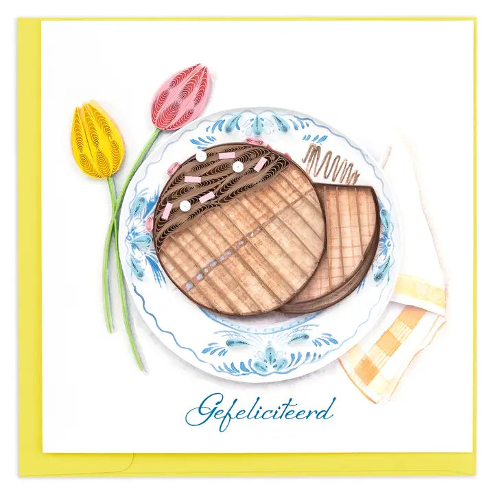 A square Dutch birthday greeting card featuring a paper-quilling style illustration of a chocolate cake on a blue-and-white patterned plate, with two paper tulips and the Dutch word 'Gefeliciteerd' at the bottom. The card has a yellow border on a white background.