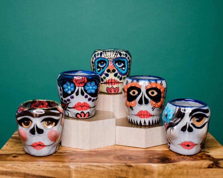 Sugar skull mugs on display