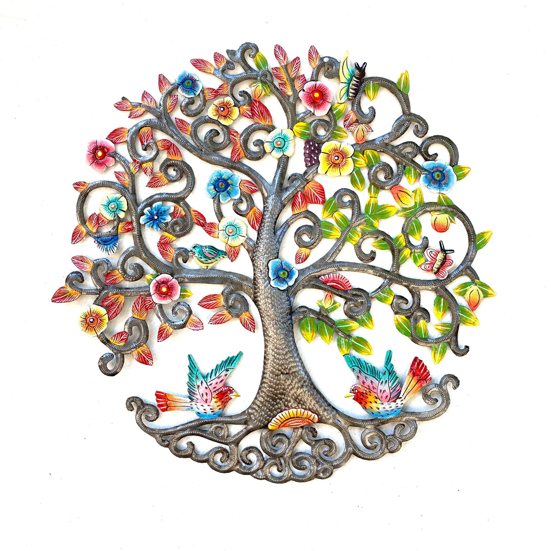 Decorative metal wall art of a tree with colorful flowers and birds on a white background