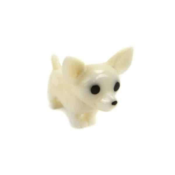 a hand carved chihuahua tagua nut